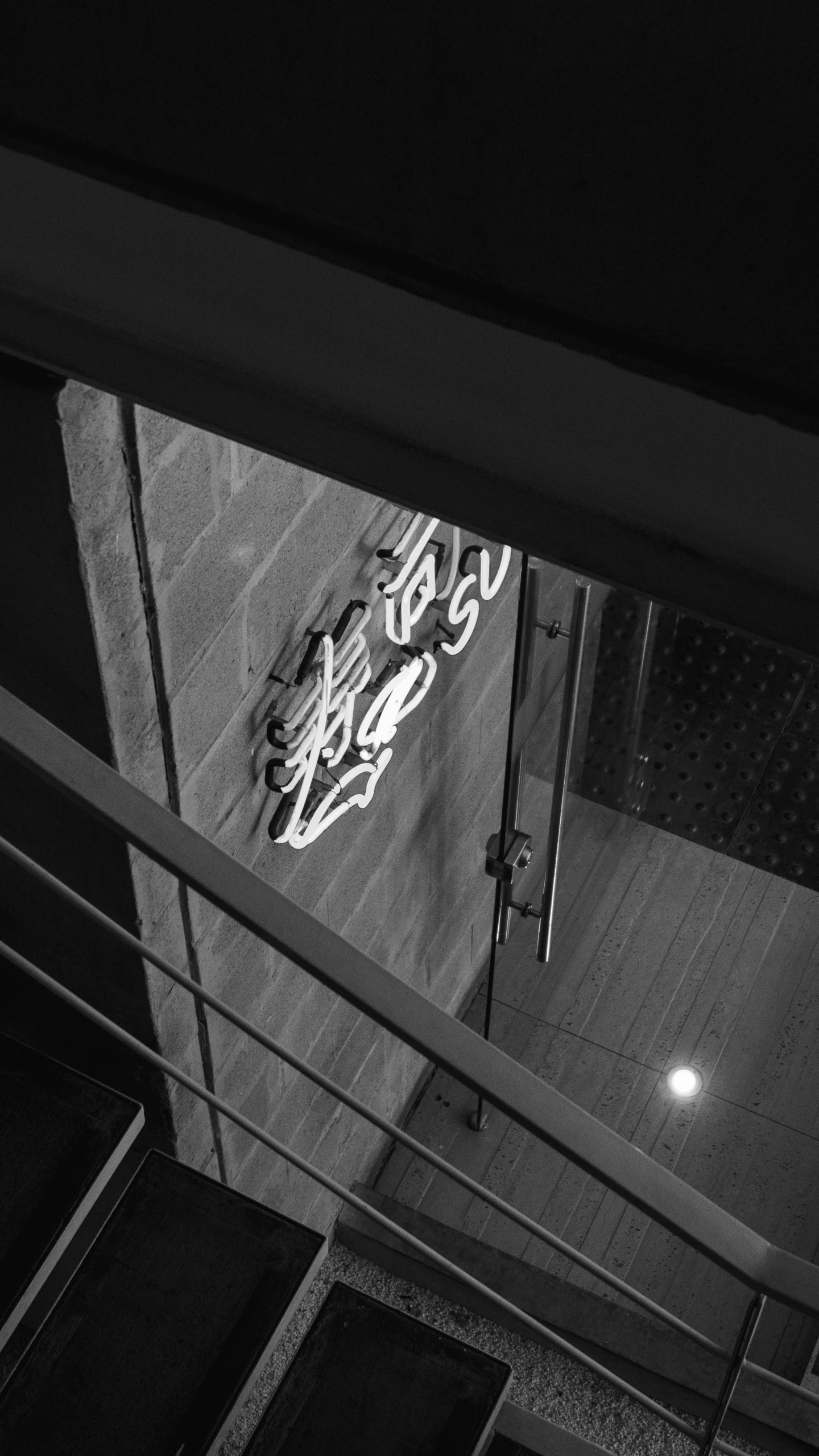 a building with steps leading up to it at night