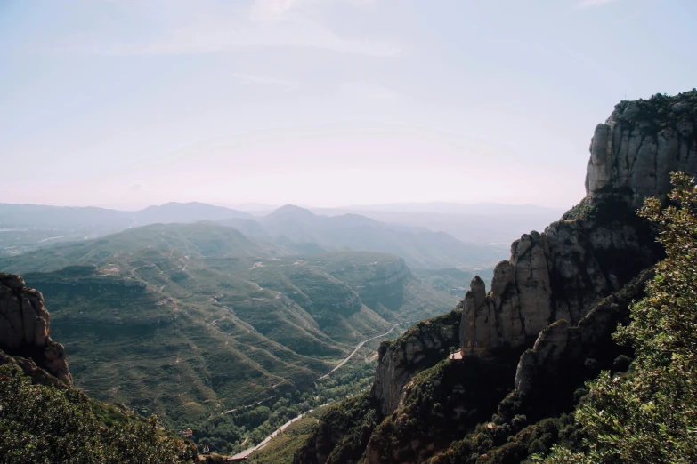 mountains are shown on top of the rocks in the wilderness