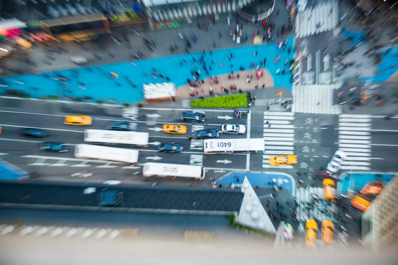 aerial view of an intersection and taxi cabs at dusk