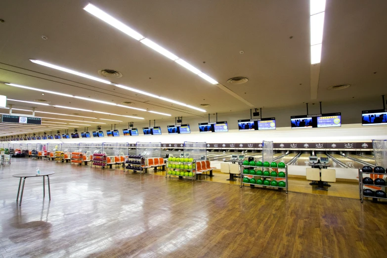 an empty shopping mall is shown as people move around