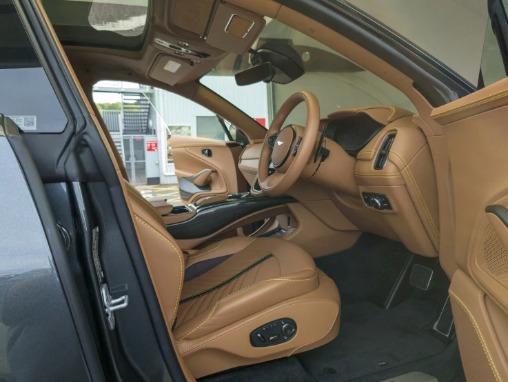 the back seats and side seats of a tan car