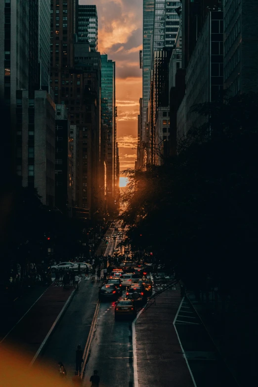 a view down a street, in the evening hours