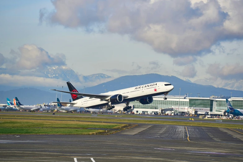 an airplane taking off from an airport runway