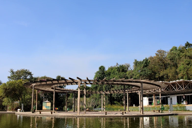 several benches and covered building over looking the water