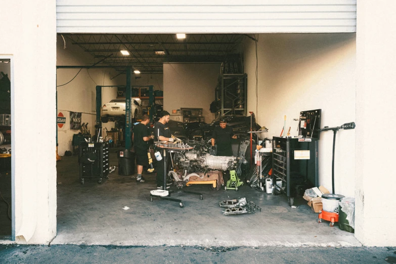 a group of people that are in a garage