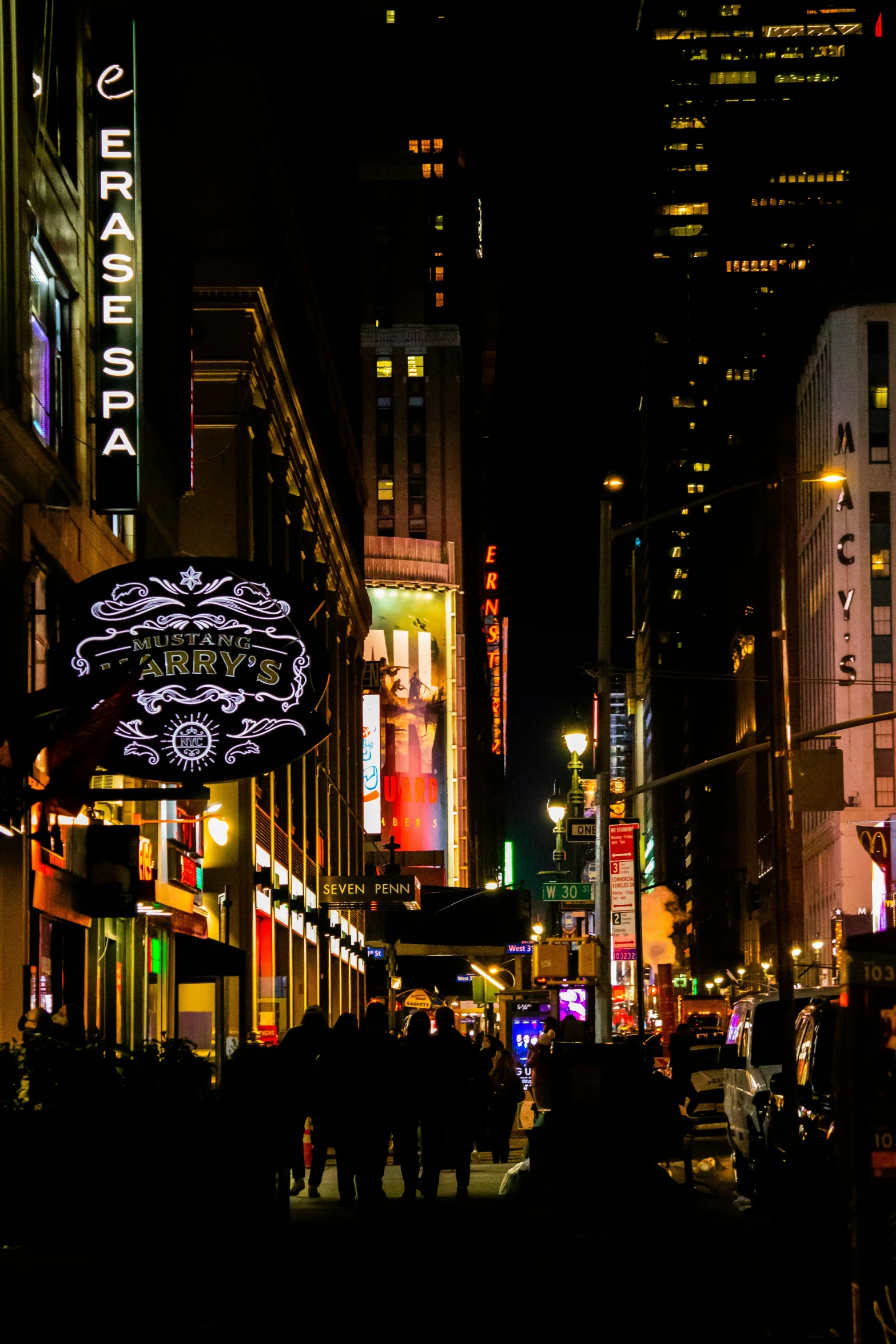 city street scene with pedestrians and neon lights