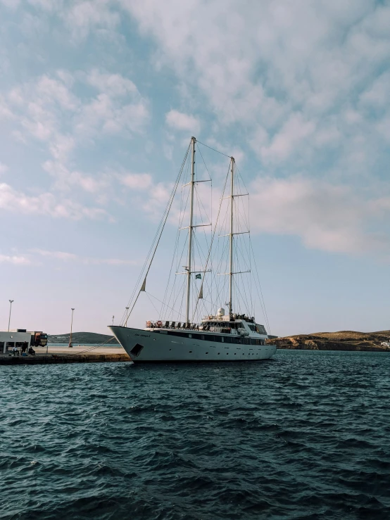 a large boat is floating through the ocean