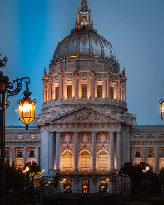 the dome of a government building illuminated with lights