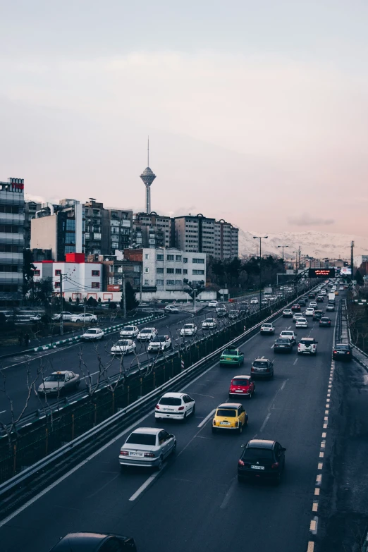 a city street filled with lots of traffic