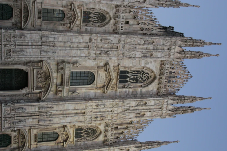 the tower of a building has many windows