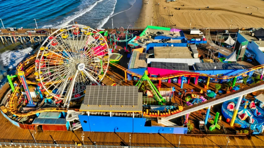 an overhead s of the rides and carnival rides at the beach