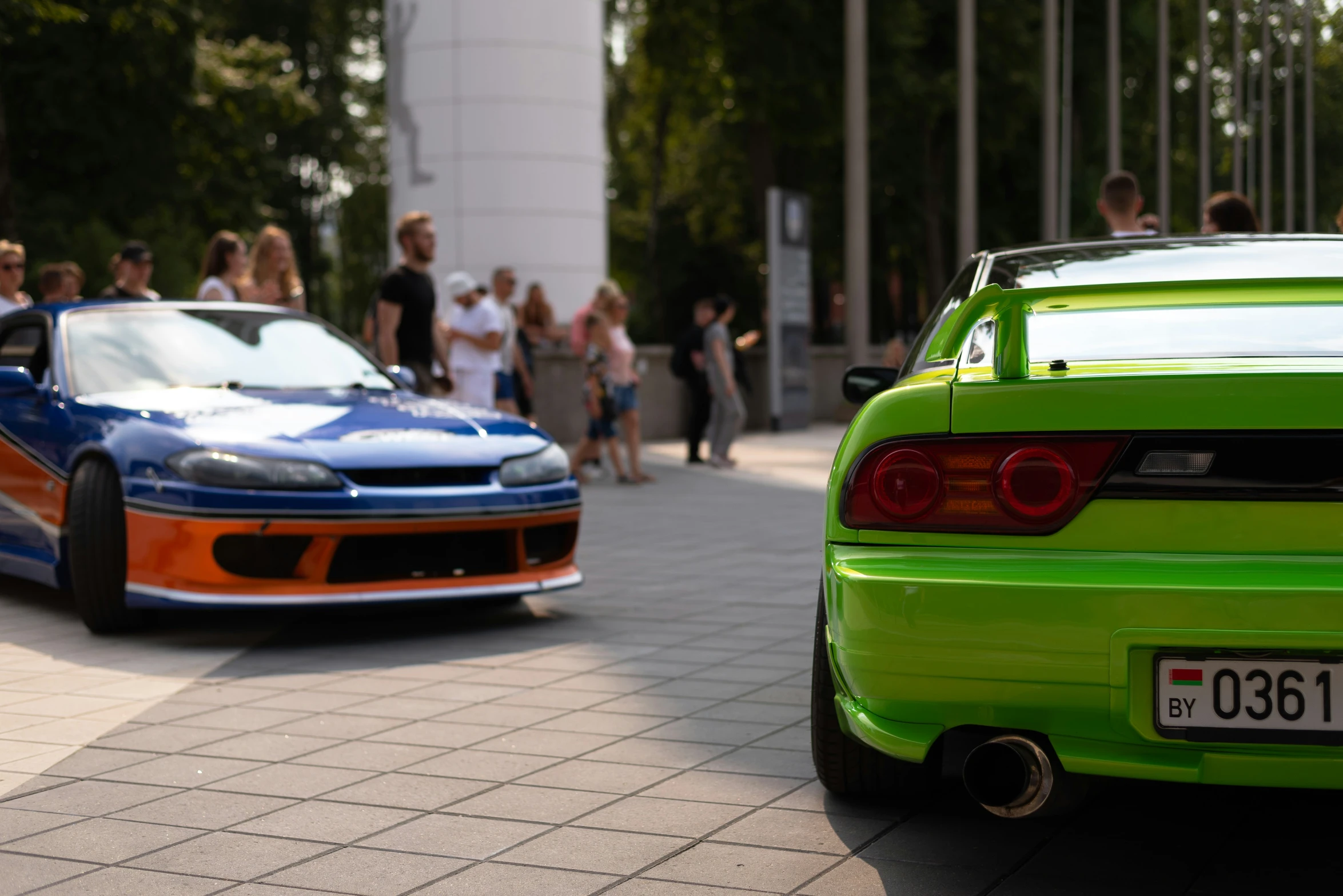 a car and a car that are parked in front of each other