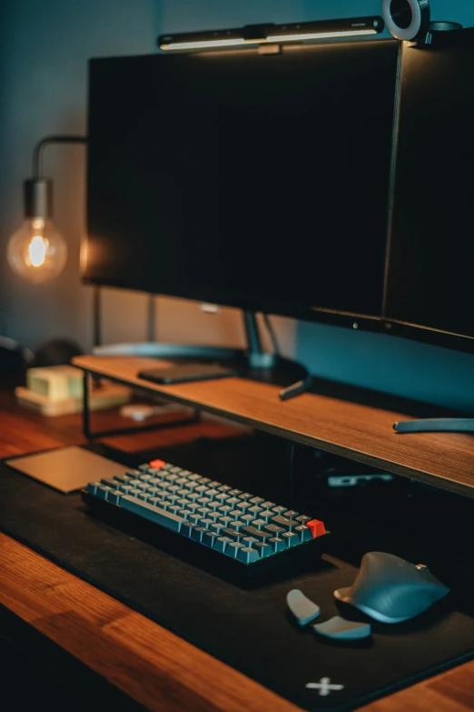 a keyboard and mouse sits on a desk