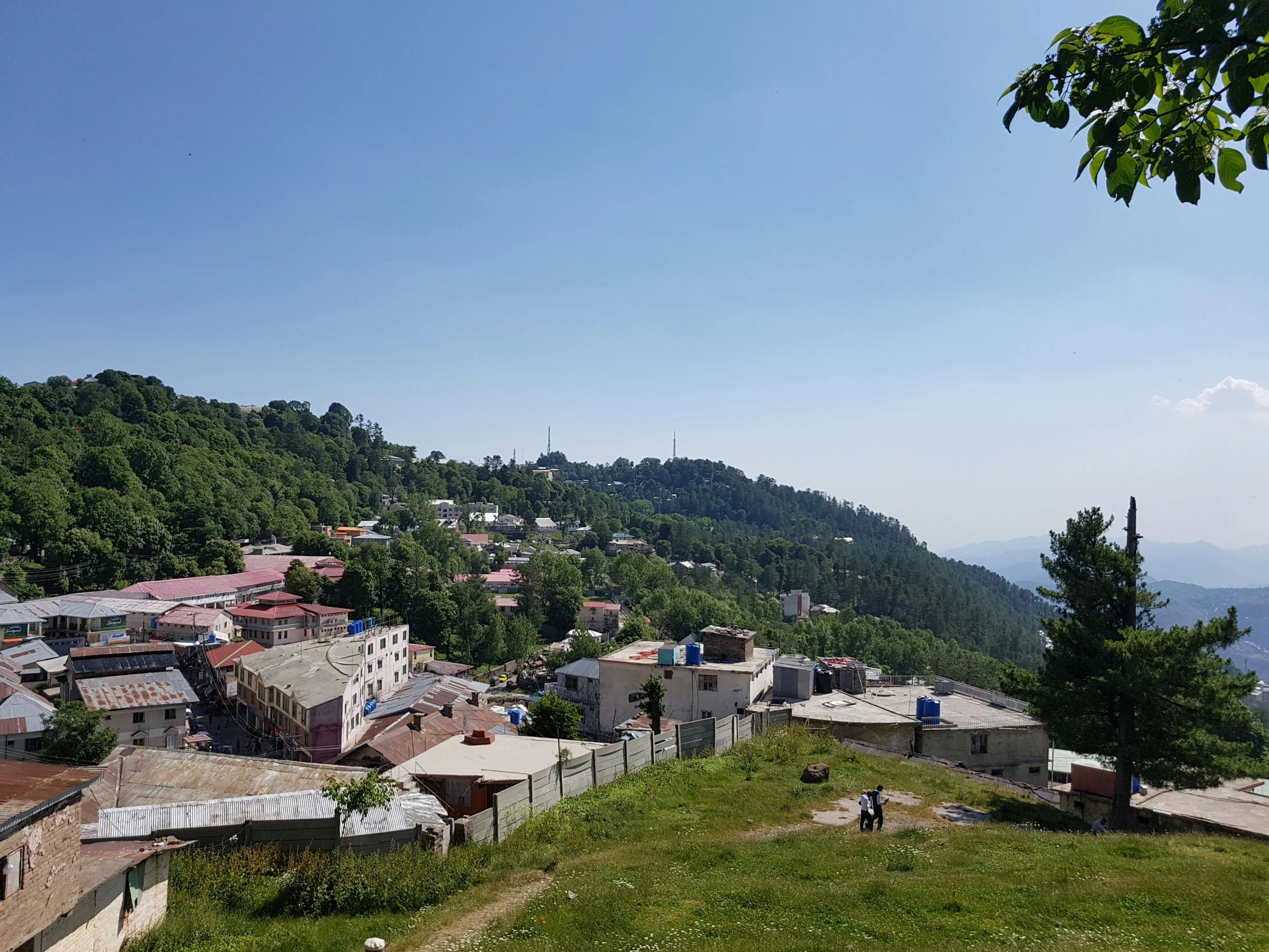 an old village with small houses on the top of it