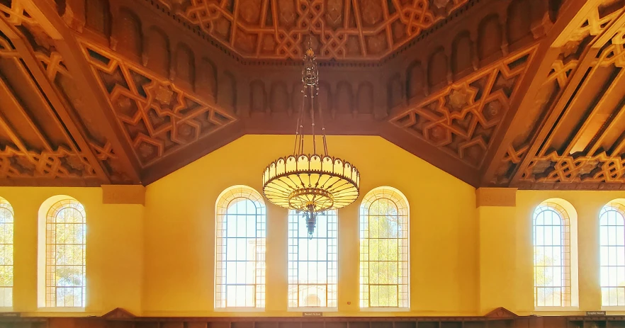 the interior of a building with stained glass windows