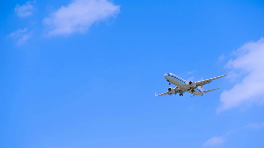 an air plane flying through the sky above