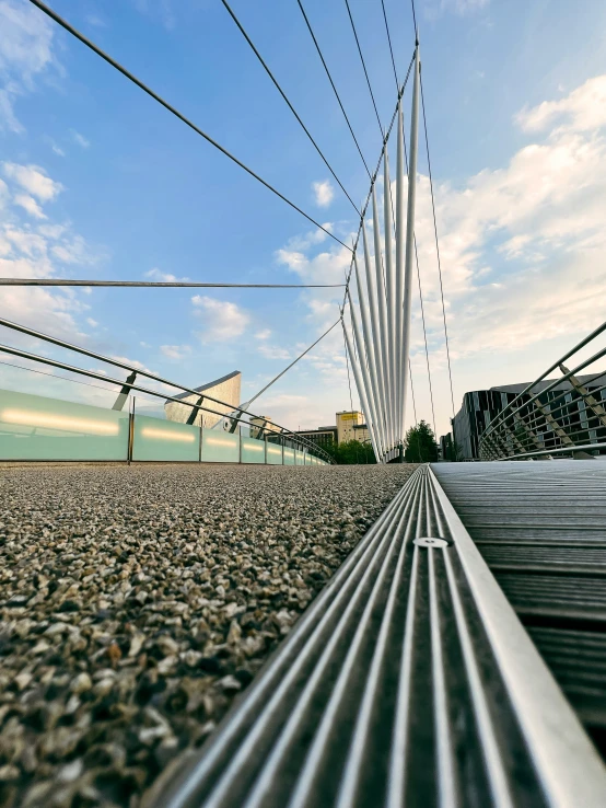 a wooden walkway that has some lines along the side