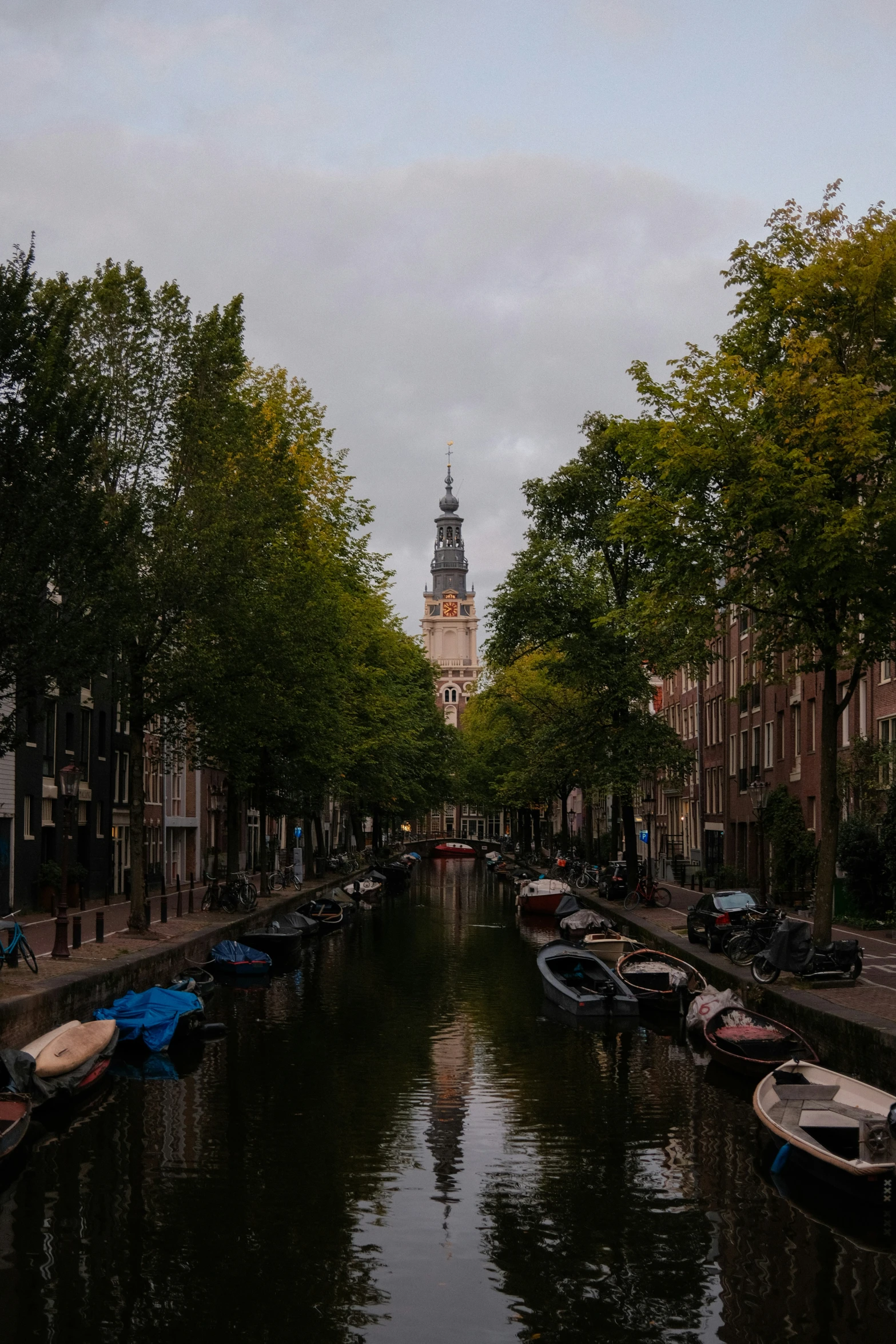 a very long canal that has boats on it