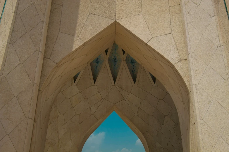 an arch is on the side of a building