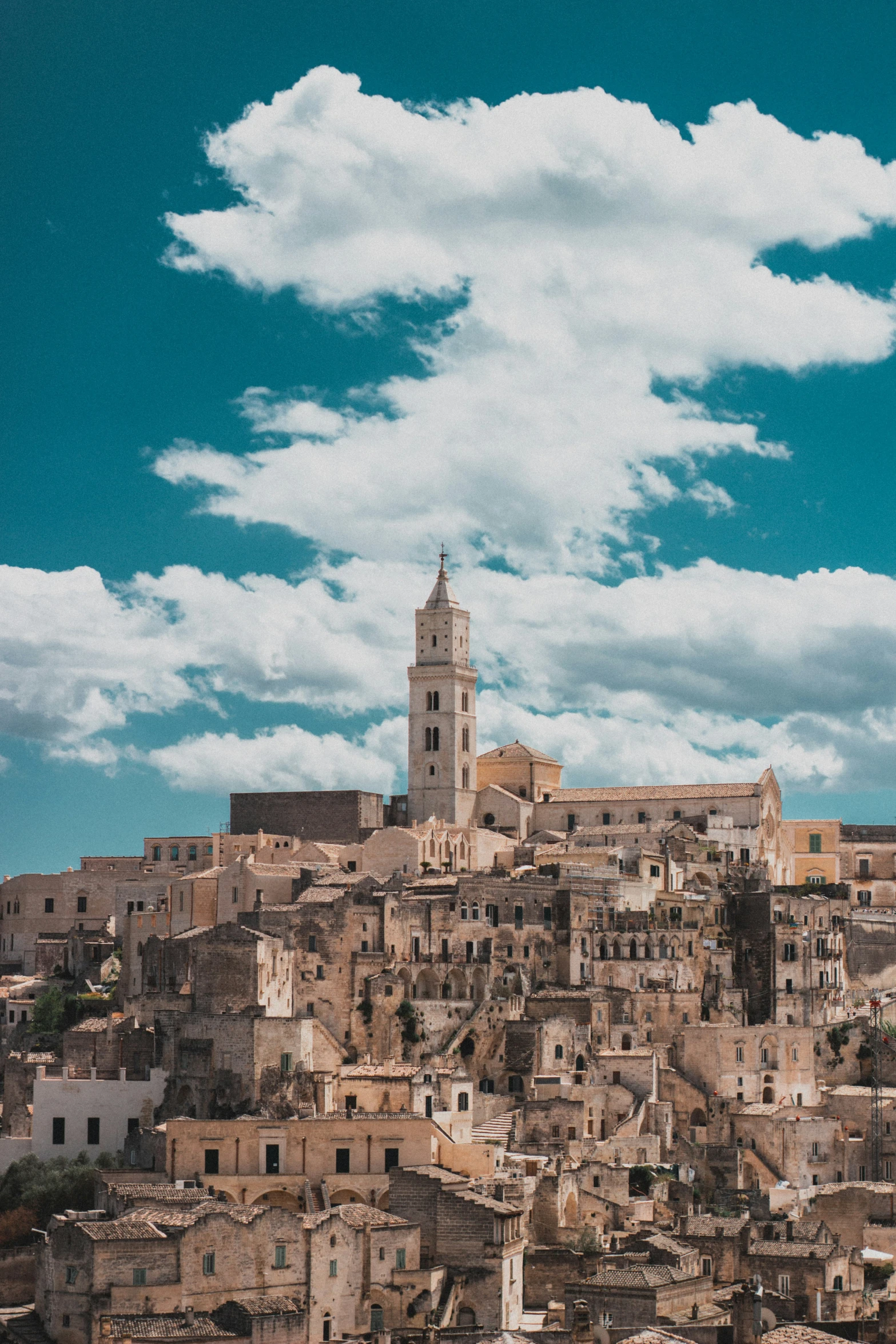 a very old looking town with a tower on top