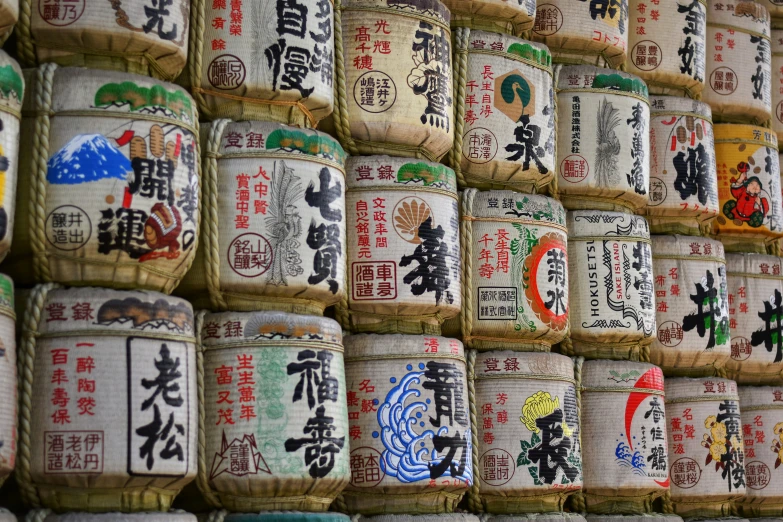 many different kinds of canned items stacked up on each other