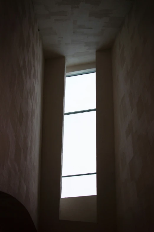 a white window in a small room