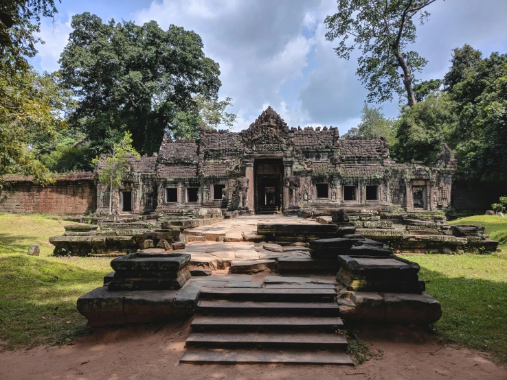 an ancient building in a jungle park