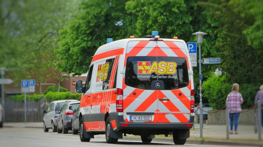 an ambulance parked on the side of the street