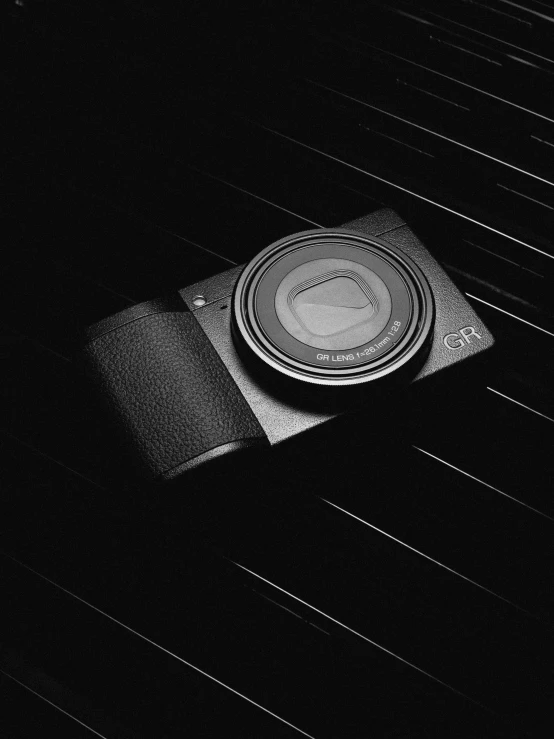 a black and white pograph of a plate on a table