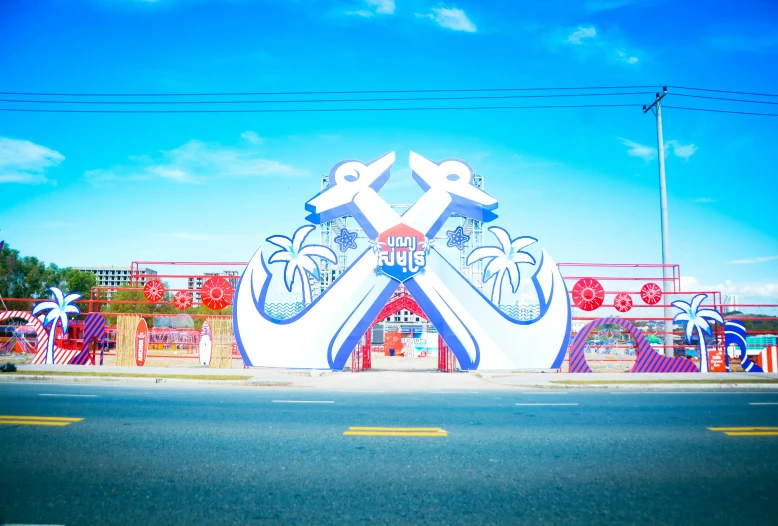 a carnival sign with some blue and white designs