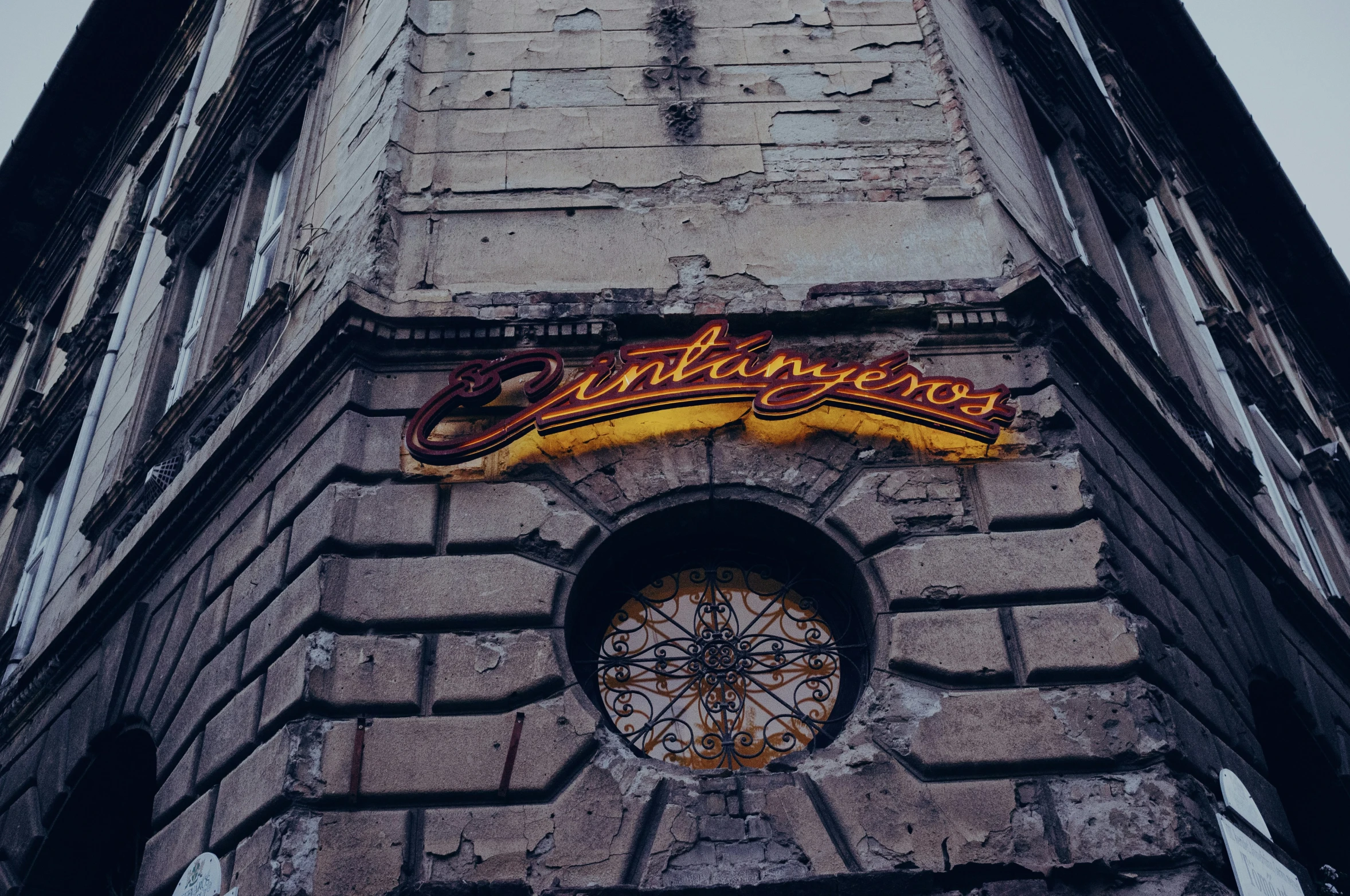 a church building with an old sign on it