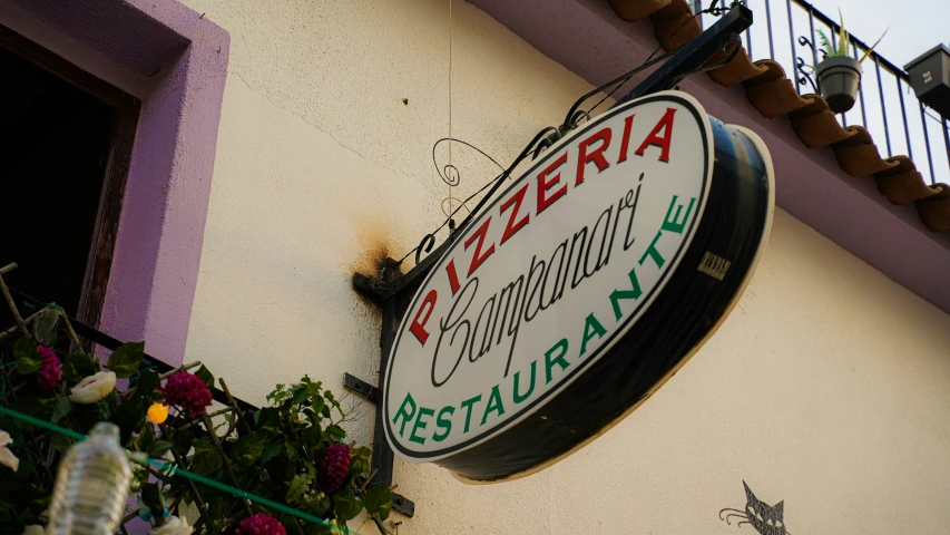 a business sign for a restaurant and coffee bar