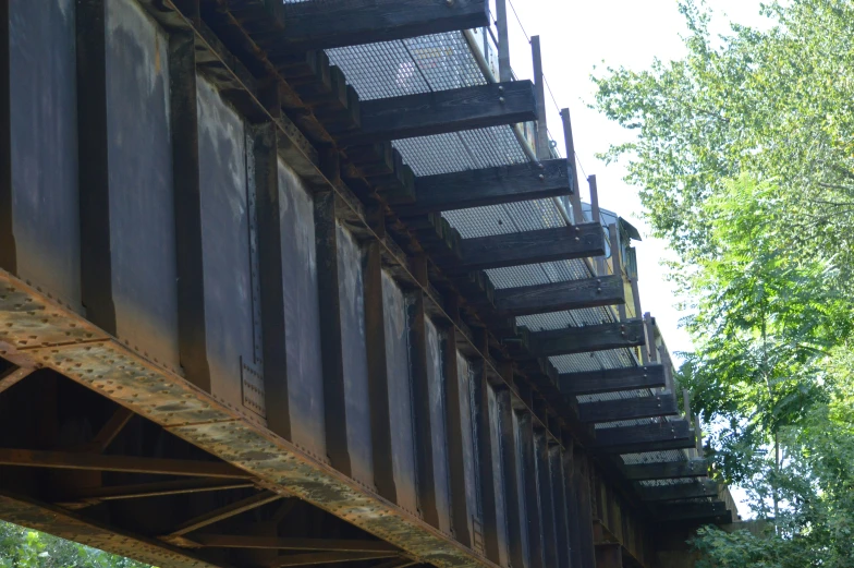 old railway bridge with rusted parts still on it