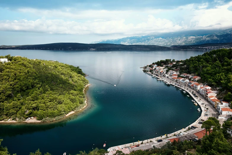 the view of a body of water with trees in it