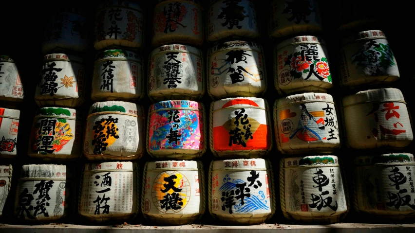 the shelves are covered with asian and japanese characters