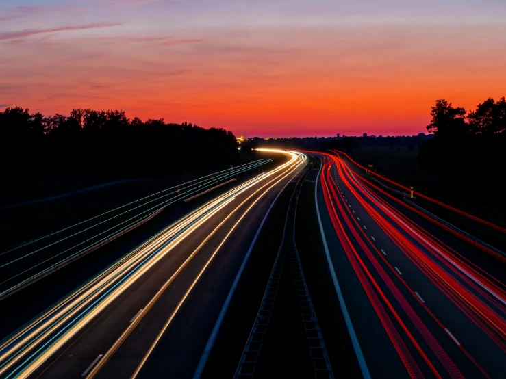 the view from a highway shows a train track