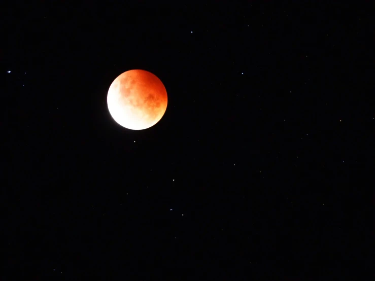 the moon and stars as seen in the sky