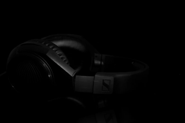 a pair of headphones sitting in the darkness