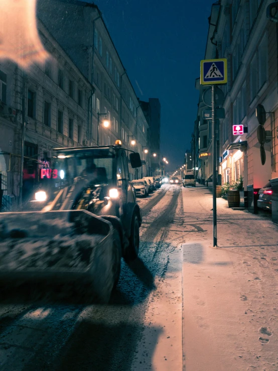 a street that has snow on the ground