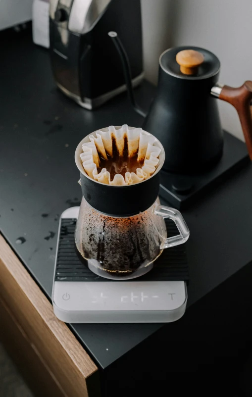 a coffee pot that has some stuff inside of it