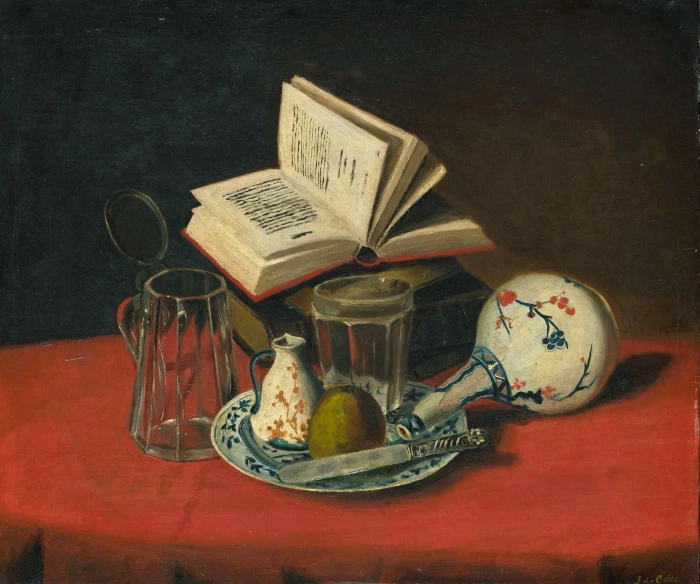 an open book with books and fruit sitting on a plate