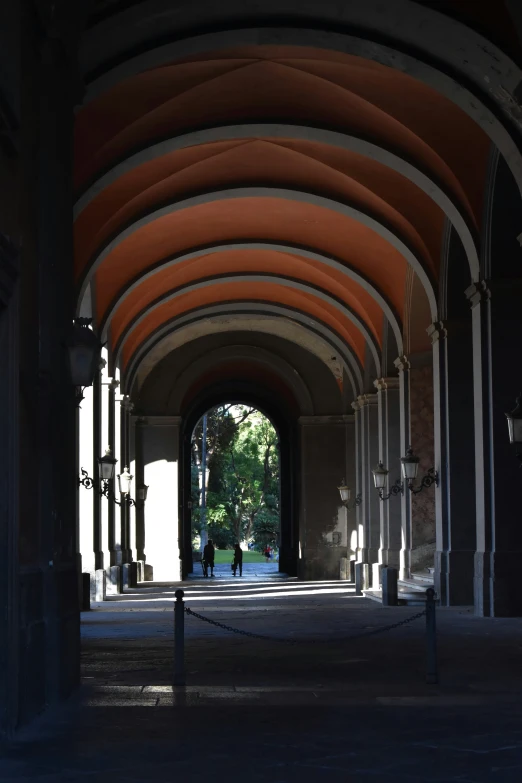 the inside of a building with many arches