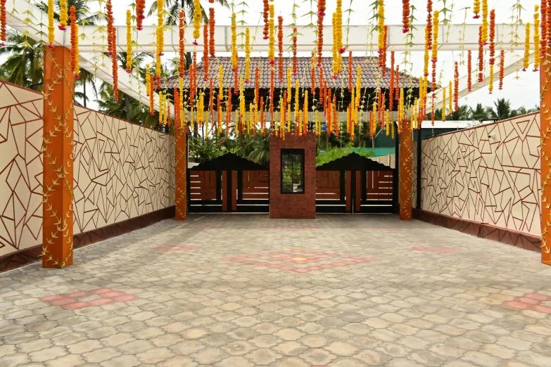 a walkway covered in a brown wooden gate