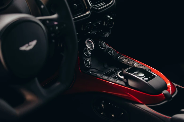 close up s of red and black car interior