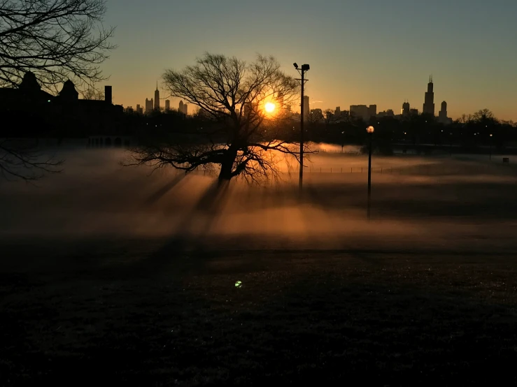 sun set behind the setting sun with steam rising