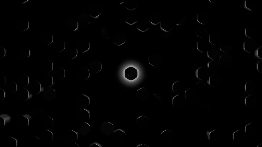 a dark wall with some smaller circles on it