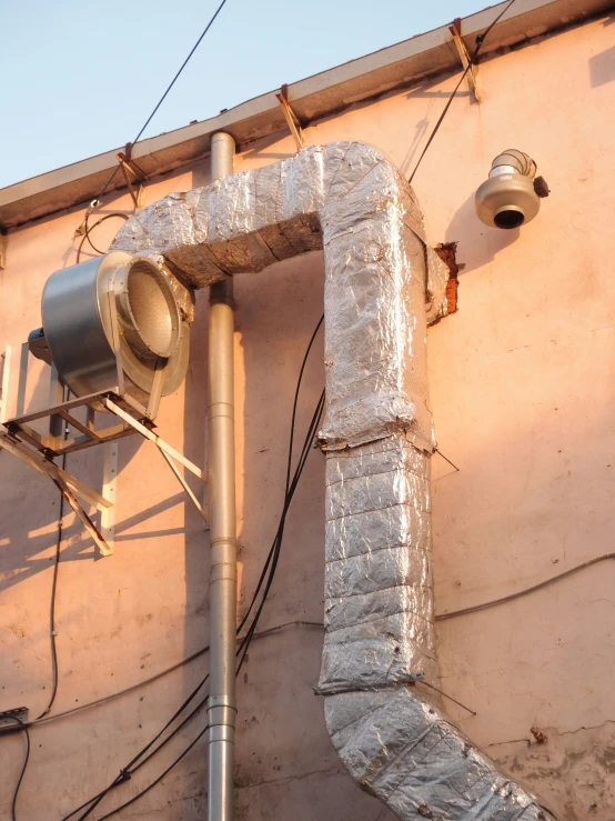 an electrical panel is next to a wall