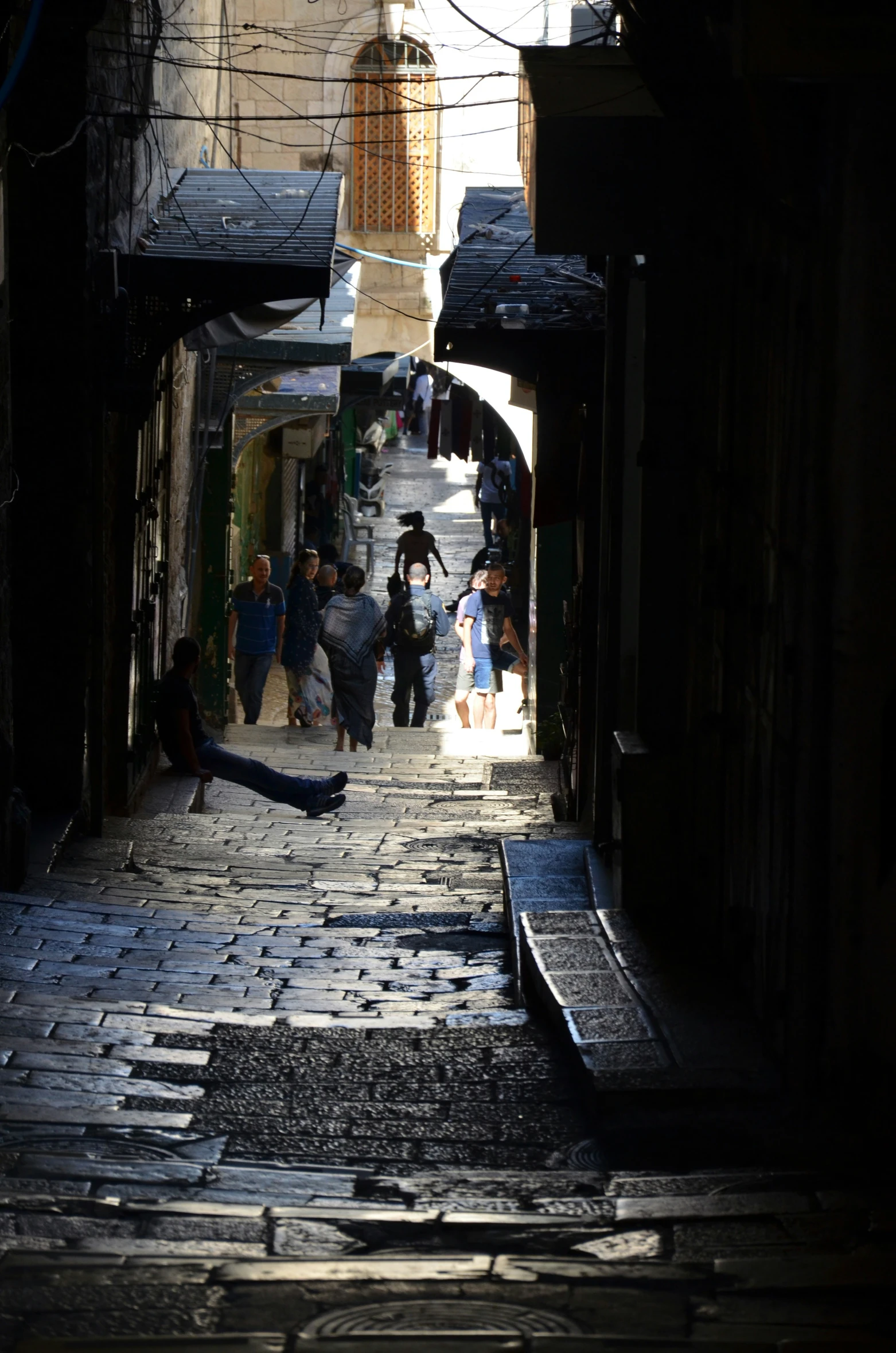 a city street that has people walking along it