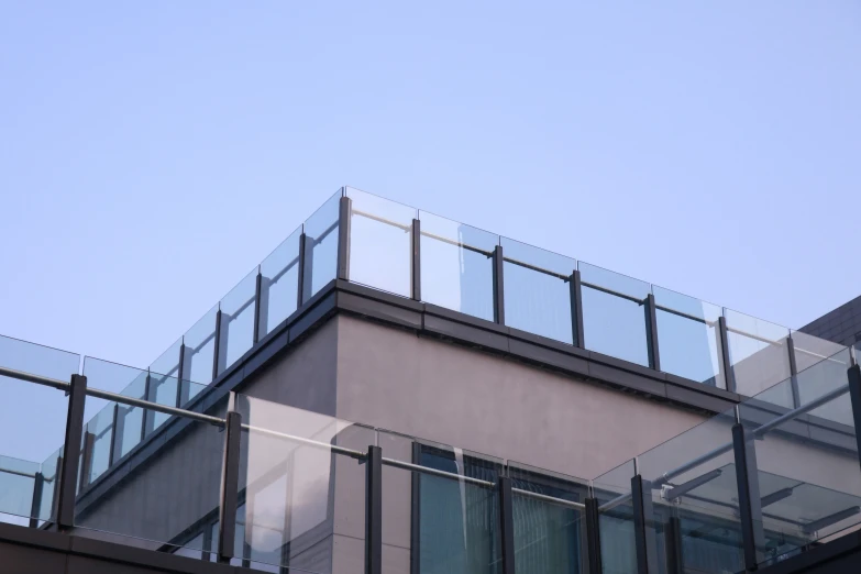 an up close view of a balcony with a fence