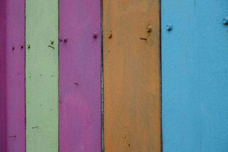 several colors of wood are displayed in this image